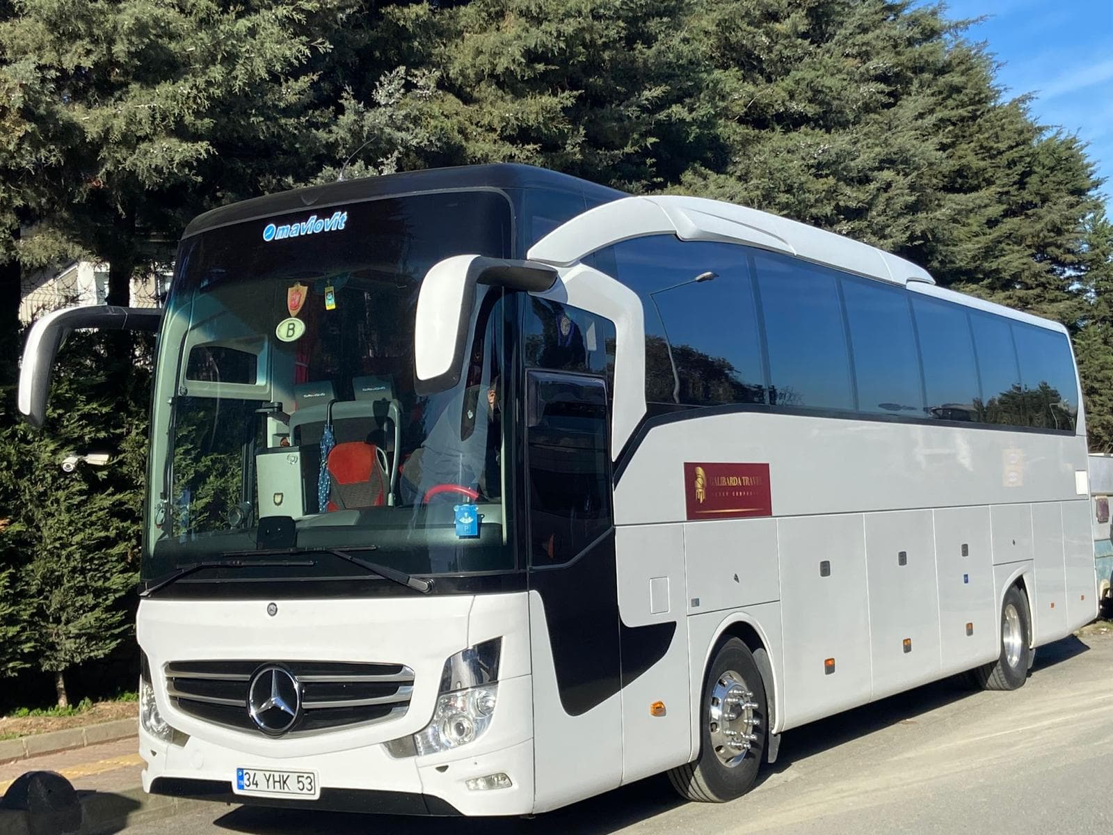 Galibarda-branded Mercedes coach on the road