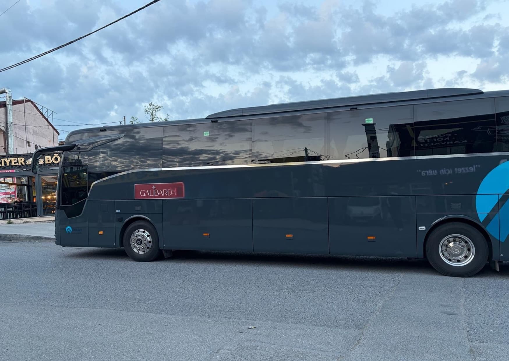 Side view of a Galibarda Mercedes long-distance coach